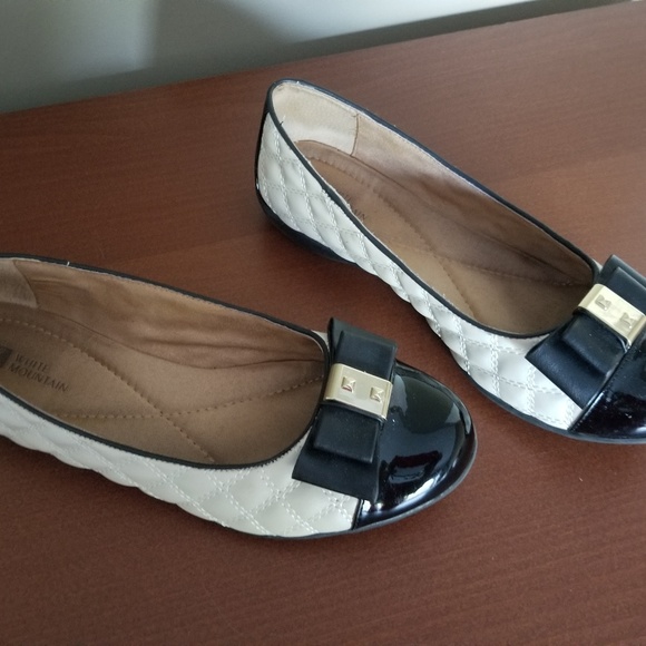 cream and black flats